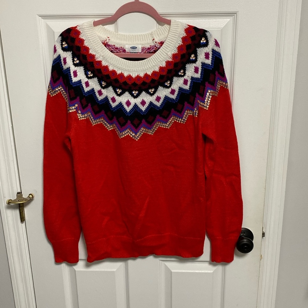 Old Navy sweater size large. Red with other accent colors and sequence.